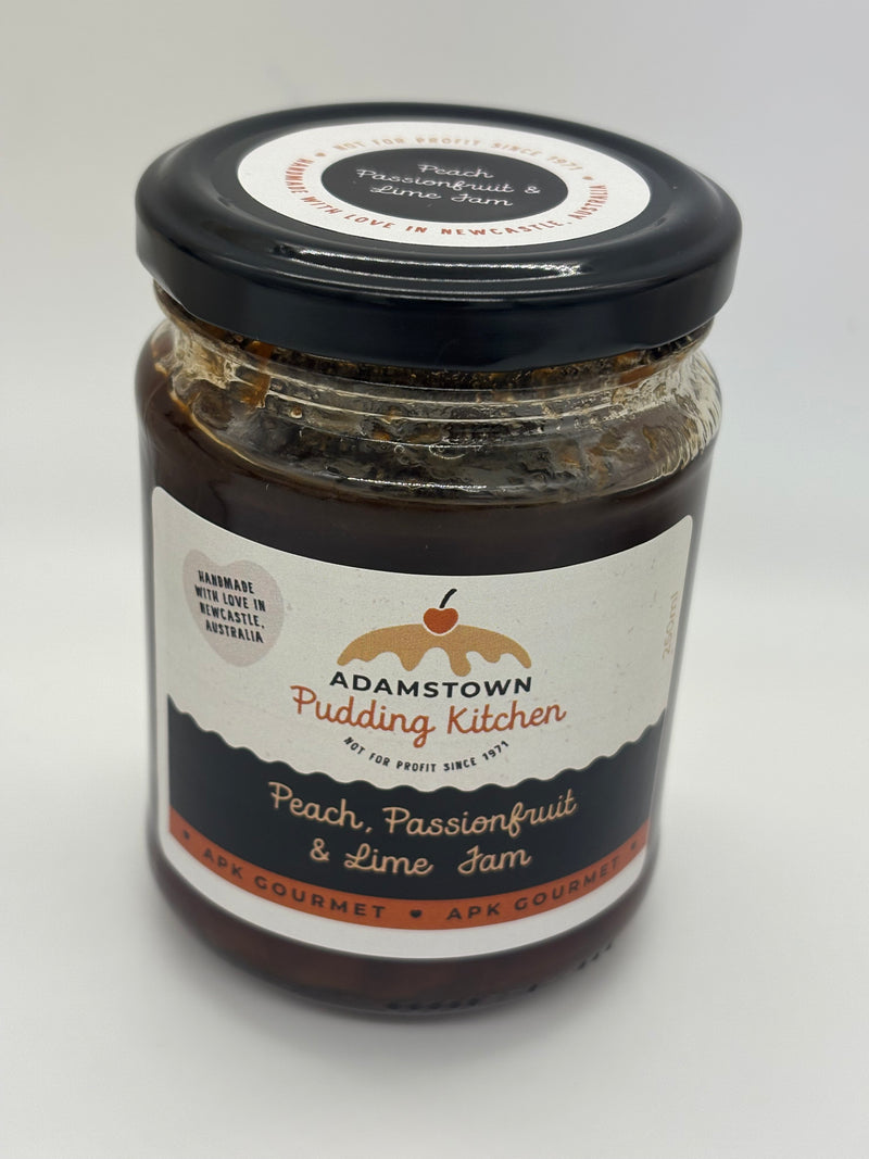 Jar of Adamstown Pudding Kitchen peach, passionfruit, and lime jam on a white background