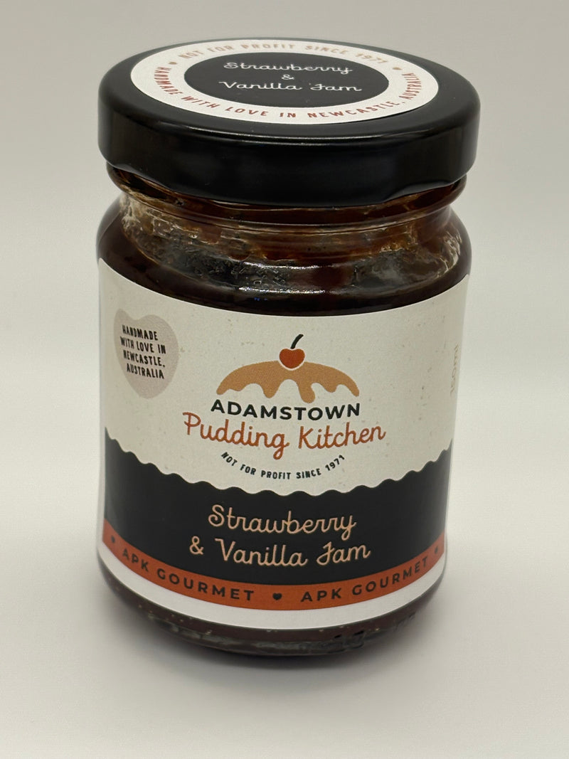 Jar of strawberry and vanilla jam with 'Adamstown Pudding Kitchen' label on a white background
